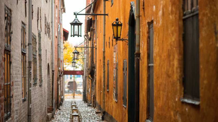 Alley Pathway Through Old Town in Autumn