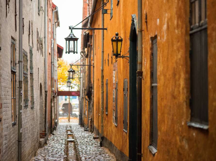 Alley Pathway Through Old Town in Autumn